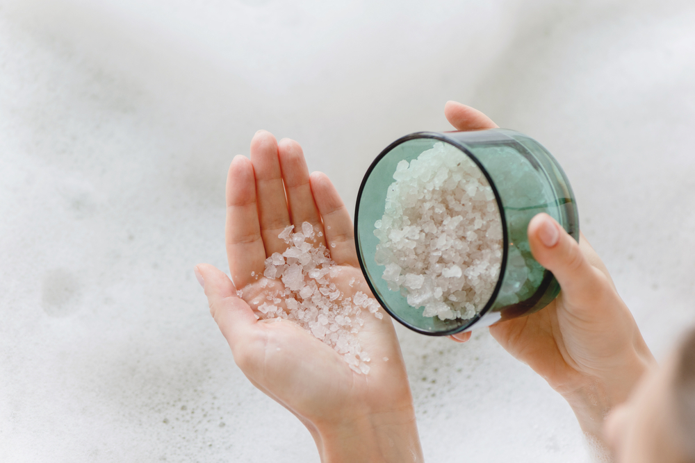 An aesthetic overhead view of a wellness-focused magnesium bath, highlighting relaxation and mineral therapy.
