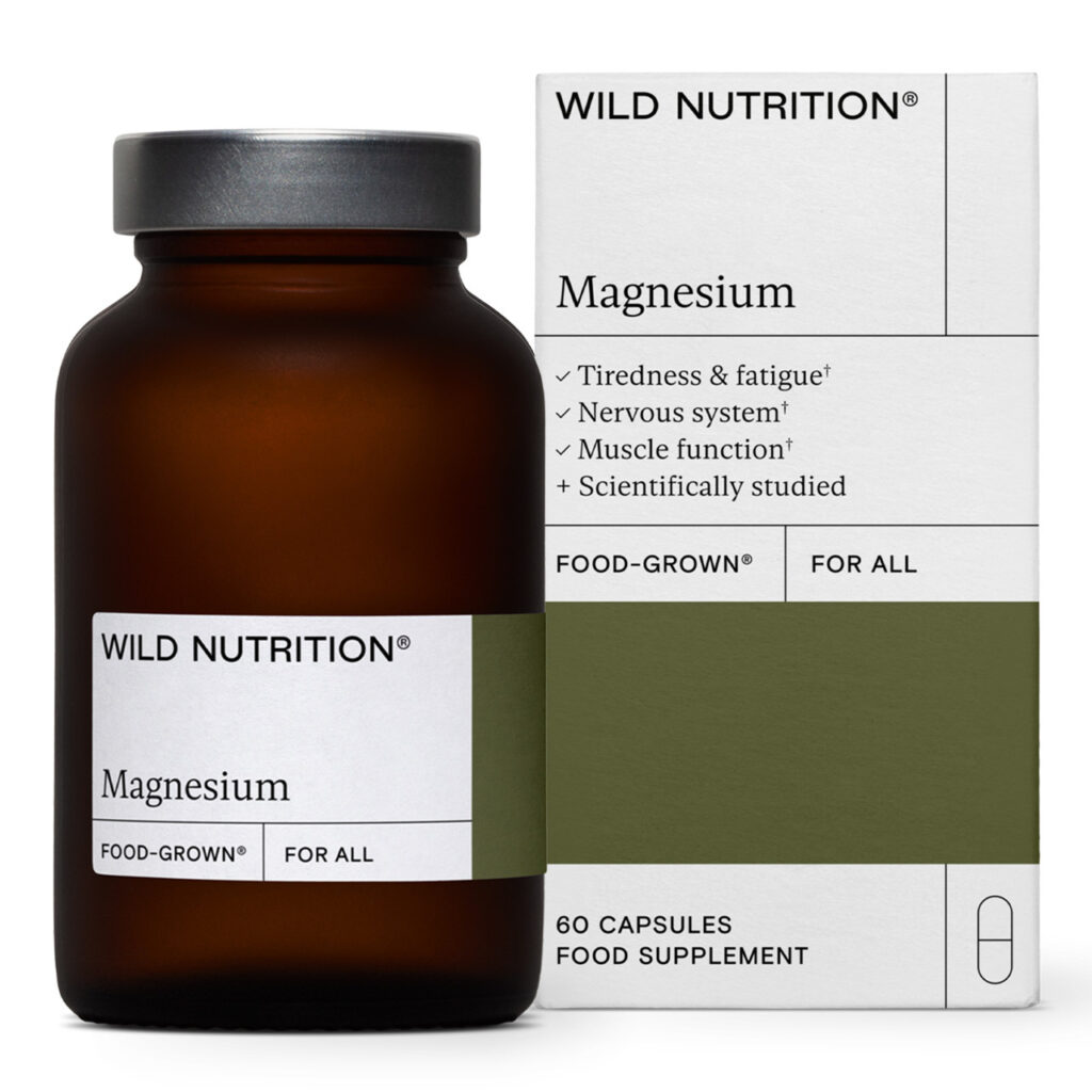 Close-up of a supplement bottle label highlighting third-party certification seals.