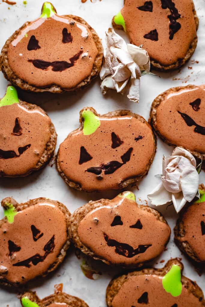 Small 2-inch pumpkin cookies made with maple syrup and whole food ingredients.