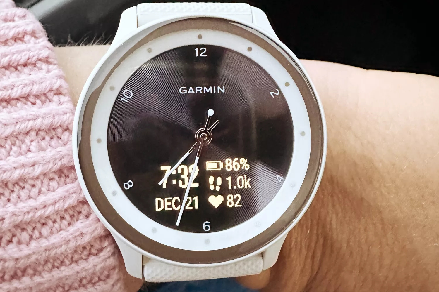 The Garmin Vivomove Sport watch featuring a clean, hybrid analog-digital design.