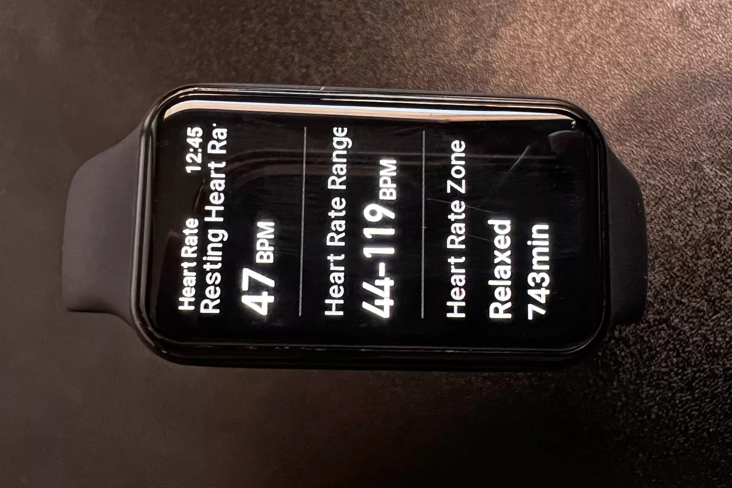 A fitness tracker displaying resting heart rate data and relaxed heart rate zones.