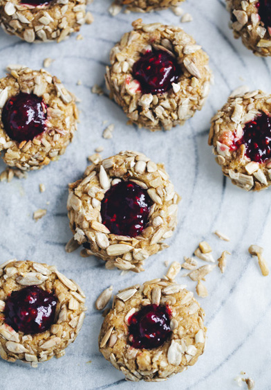 A slice of paleo-friendly carrot cake made with almond flour and dates.